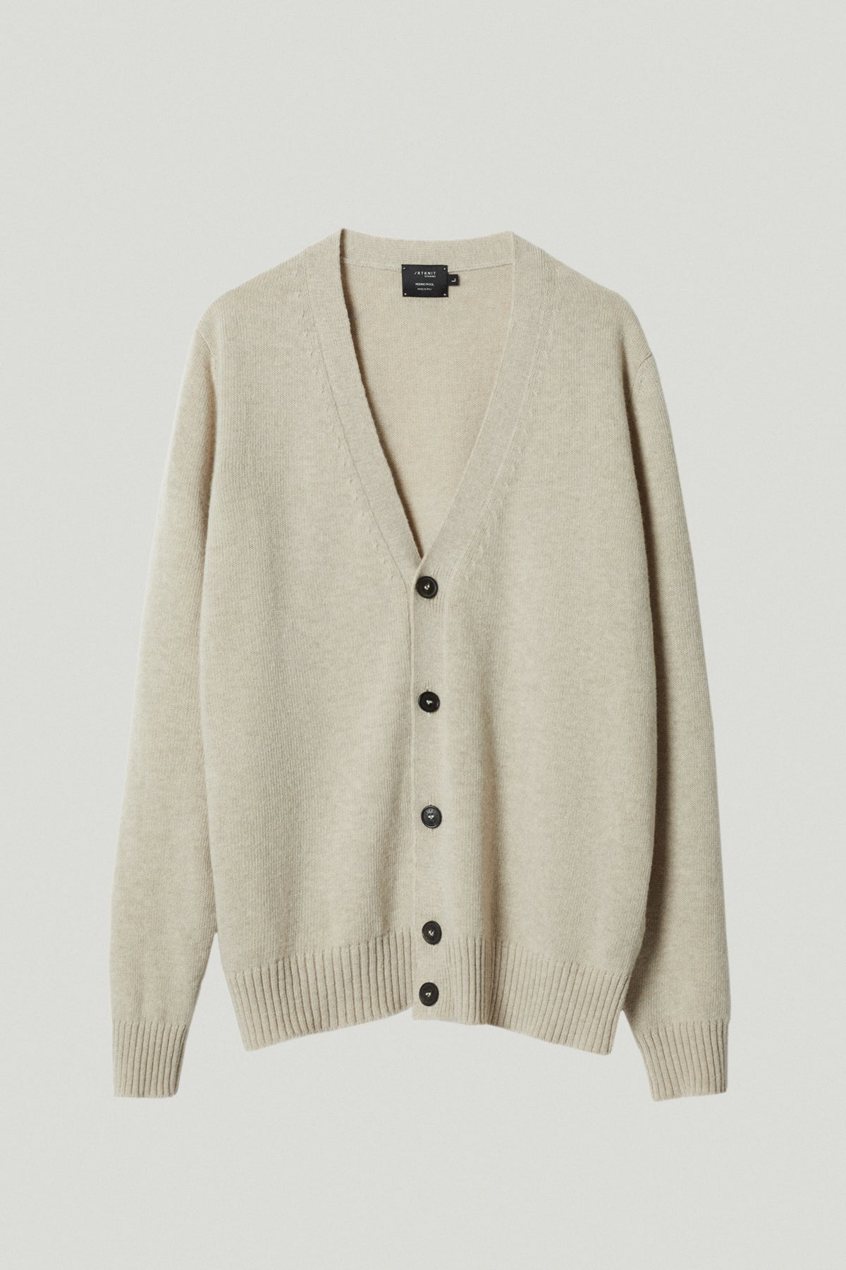 the woolen cardigan ecru