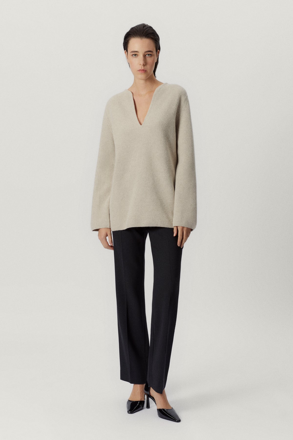 the woolen oversize v neck ecru