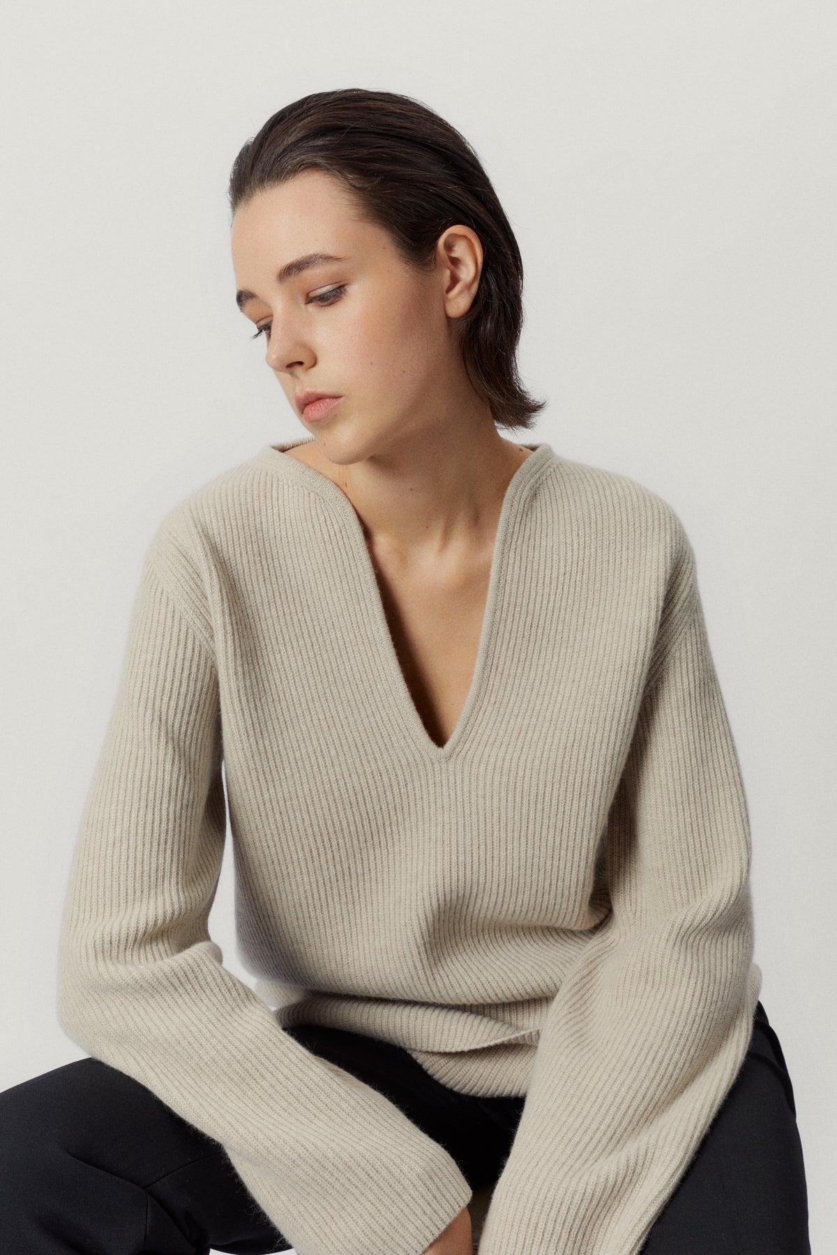 the woolen oversize v neck ecru